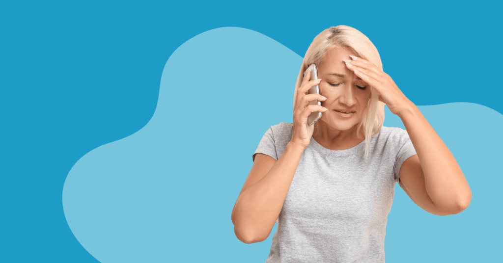 Distressed woman talking on phone